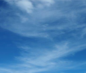 American Flag in a clear sky.